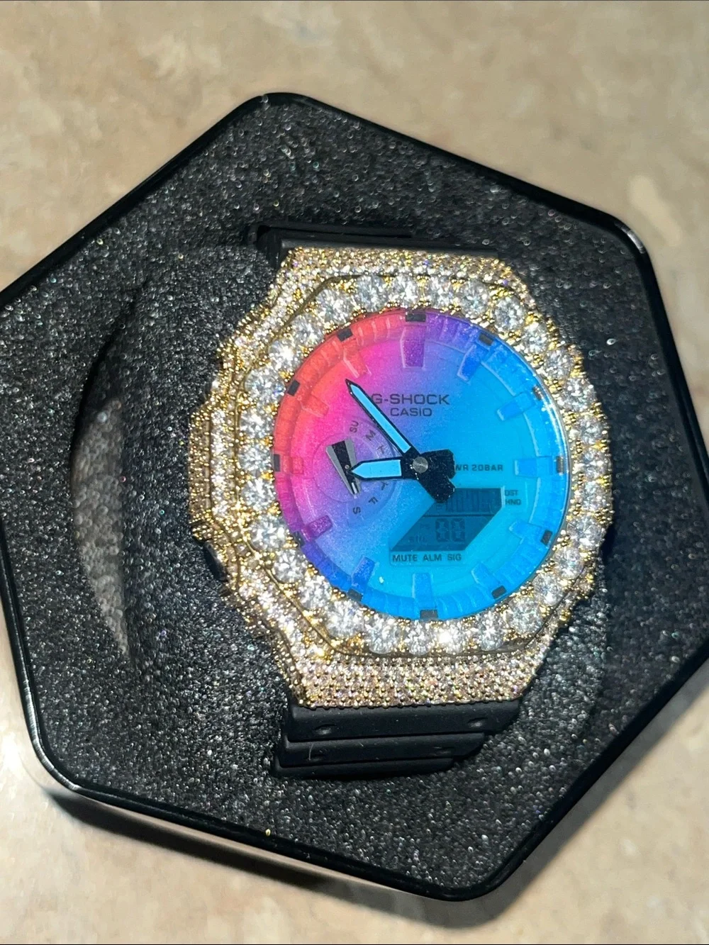 G-Shock Gold Bezel Watch with Pink-to-Blue Gradient Dial